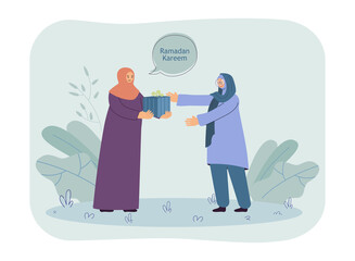 Muslim woman giving present to friend or mother. Female cartoon characters in traditional clothes celebrating Ramadan flat vector illustration. Ramadan, celebration concept for banner, website design