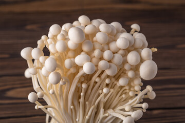 Fresh Enoki mushrooms  with selected focus.Enoki, also known as velvet shank, is a species of edible mushroom in the family Physalacriaceae.