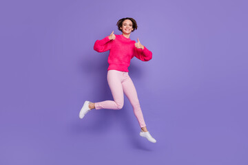 Fototapeta na wymiar Full body photo of cheerful girl have fun show two thumbs up wear trousers shoes isolated on violet color background