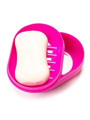 Travel soap in plastic soap dish isolated on white background