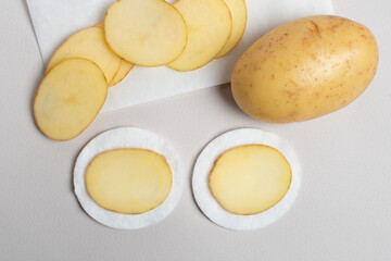 Sliced Potatoes prepared for cosmetic procedures.