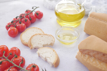 slice of whole meal bread and olive oil on table 