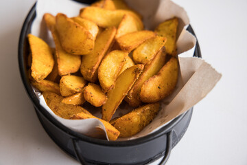 fresh and hot french fries on plate