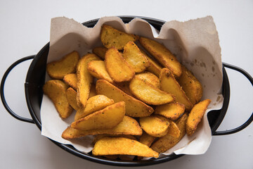 fresh and hot french fries on plate