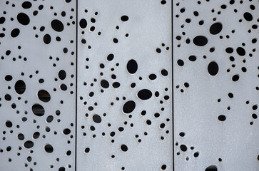 texture of holes in facade