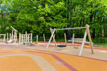 Empty modern outdoor playground in summer. A beautiful place for children's games, sports and...