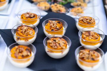 Gourmet appetizers on a table buffet.