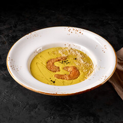 Cheese soup with shrimps. photo for the menu, traditional food.