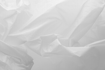 White feathers on a white background