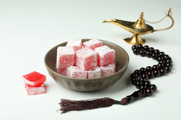 Concept of tasty food with turkish delight on white background