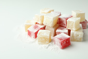 Delicious turkish delight cubes on white background