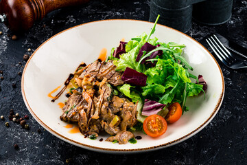 Grilled meat steak and fresh vegetables salad