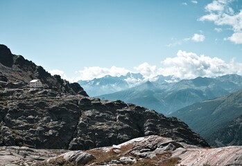 Panoramic view from a mountain peak in the italian Alps on a summer day (Trentino, Italy, Europe)