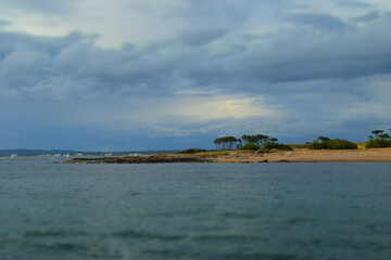 cloudy island in the ocean 