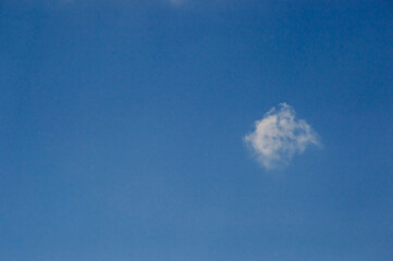 Background of white fluffy cloud in the blue sky.Close up