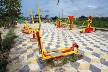 Sports simulators on the playground: horizontal bars and other equipment. Sports ground.