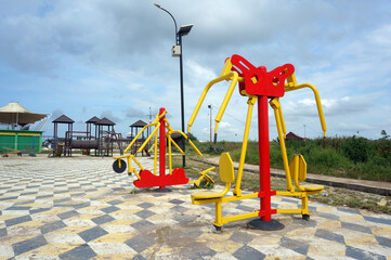 Sports simulators on the playground: horizontal bars and other equipment. Sports ground.