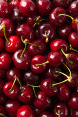 Close up of pile of ripe cherries background