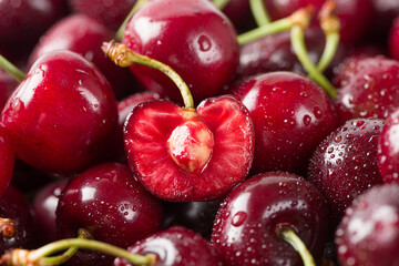 close up of ripe cherries fruit with sliced background.