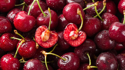close up of ripe cherries fruit with sliced background.