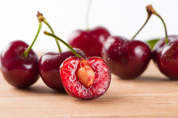 Cherries fruit  on wood background.