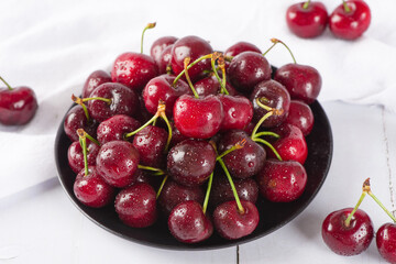 Cherries fruit  on wood background.