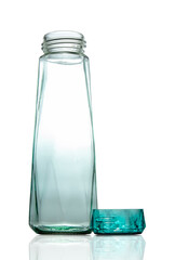 clear green crystal bottle on white background