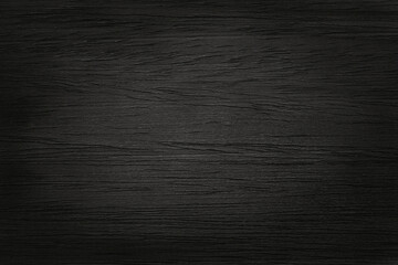 Black wooden wall background, texture of dark bark wood with old natural pattern for design art work, top view of grain timber.