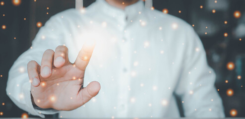 Businessman on blurred background touching network. network hologram over dark background.global structure networking and data exchanges.