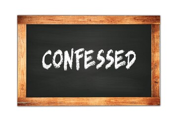 Obraz premium CONFESSED text written on wooden frame school blackboard.