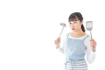 クッキングをする若い女性