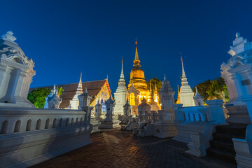Wat Suan Dok is a Buddhist temple (Wat) at twilight night sky background is a major tourist attraction in Chiang Mai Northern Thailand.Travels in Southeast Asia.