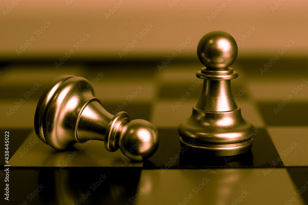 Poster closeup of chess characters on board games. to represent decision making in term of business strateg
