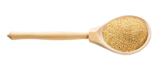 wooden spoon with raw amaranth grains isolated