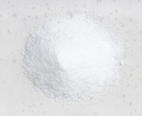 top view of glutamate flavoring close up on gray