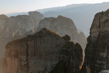 Mysterious rocks of Meteora, Greece is one of the gems of Greece. Rock pinnacles topped with a total of 24 monasteries in the rays of sunset light