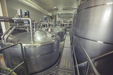 Modern food and drink cellar with stainless steel tanks