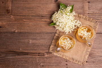 Fototapeta na wymiar Elderberry flower tea. Refreshing summer drink, healthy lifestyle concept