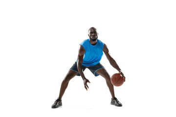 Full length portrait of a basketball player with a ball isolated on white studio background. advertising concept. Fit african american athlete jumping with ball.