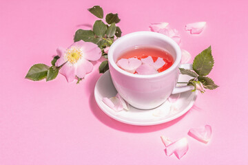 Tea from rose hips flowers, vitamin drink, hard light, dark shadow