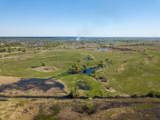 Fototapeta na wymiar Green meadow. Aerial drone view.