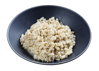 cooked porridge from pearled barley in gray bowl