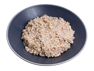 kasha from green buckwheat in gray bowl isolated