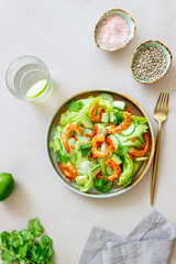 Salad with shrimp, cucumbers and avocado. Healthy eating. Vegetarian food.