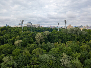 Fototapeta na wymiar View of Kiev from behind the hill. Aerial drone view.