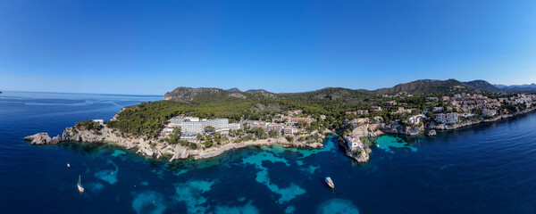 seacoast of the beach in mallorca with beaturiful view of the sea. Sea view of turquoise colour. Concept of summer, travel, relax and enjoy