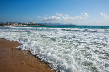 Beautiful landscape of embankment beach near sea of tourist town on background of blue sky, Bulgaria, Europe