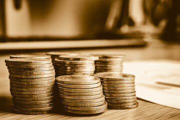 Gold coins stacks is representing riches and wealth management. Coin stack growing and find out the way to get a return on investment. Finance and money exchange investment as concept.