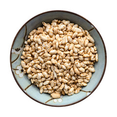 top view of puffed brown rice in bowl isolated