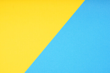 two color paper background in yellow and blue